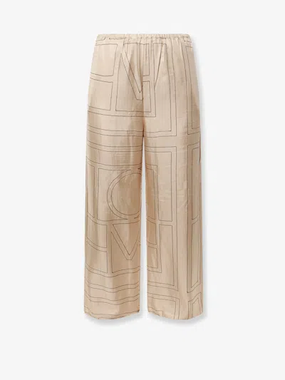 Totême Silk Trousers With Monogram Logo Embroidery In Brown