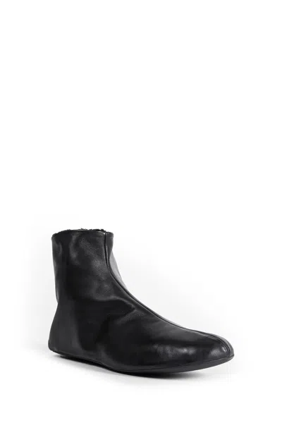 The Row Stella Boots In Leather And Shearling In Black
