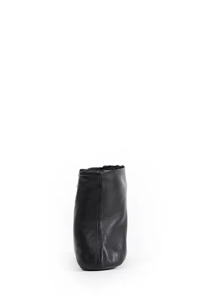 The Row Stella Boots In Leather And Shearling In Black