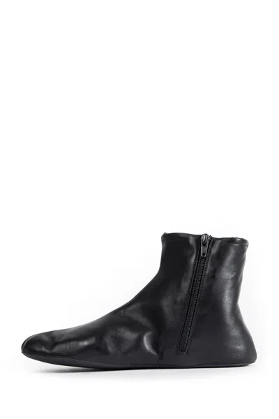 The Row Stella Boots In Leather And Shearling In Black