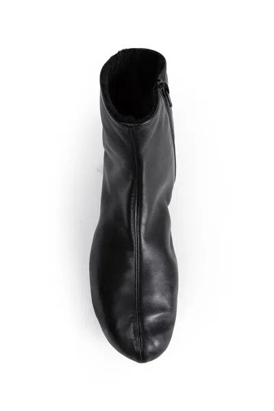 The Row Stella Boots In Leather And Shearling In Black