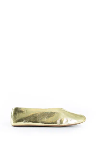 The Row Stella Slippers In Leather In Gold