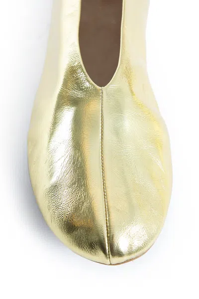 The Row Stella Slippers In Leather In Gold