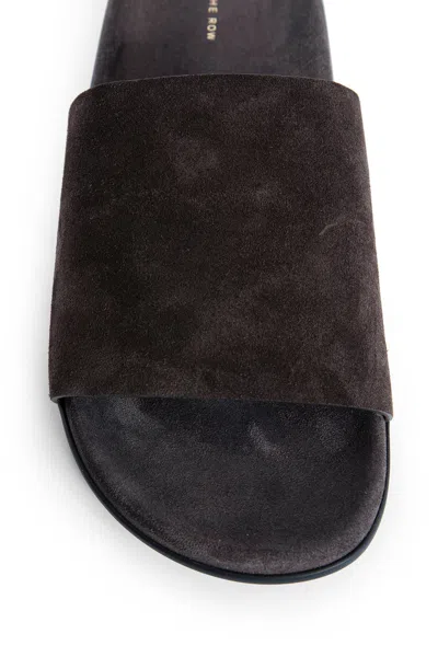 The Row Hugh Slides In Suede In Brown