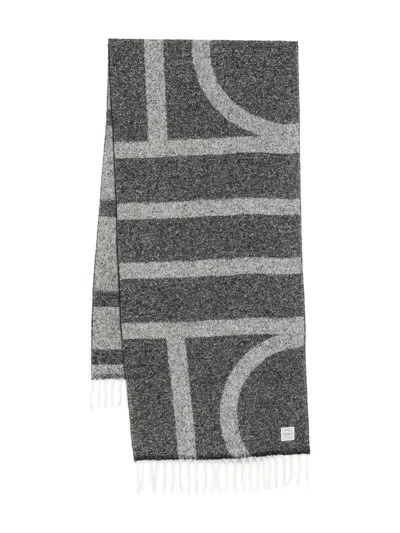 Totême Rectangular Wool Scarf Featuring Monogram Design In Black