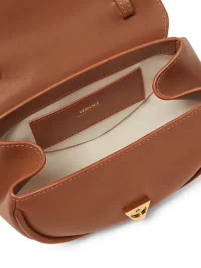 Versace Small Virtus Leather Shoulder Bag In Brown