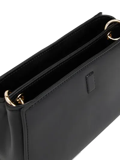 Tommy Hilfiger Logo-plaque Cross Body Bag In Black