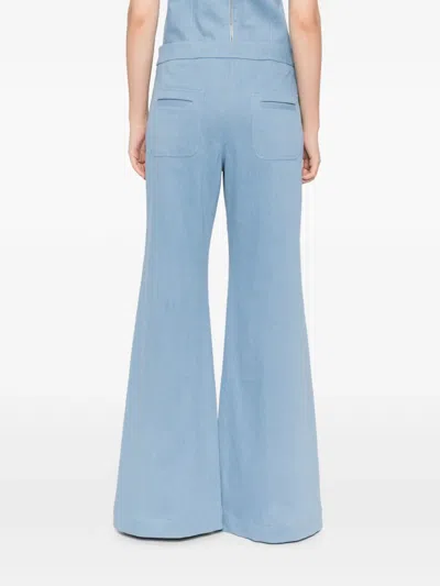 Blaklace Button Flared Trousers In Blue