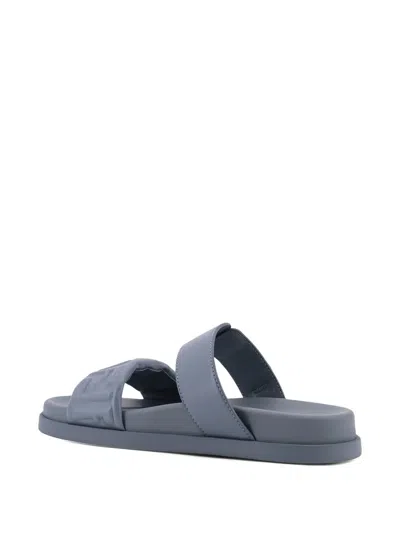 Fendi Feel Embossed Ff Leather Flat Sandals In Blue