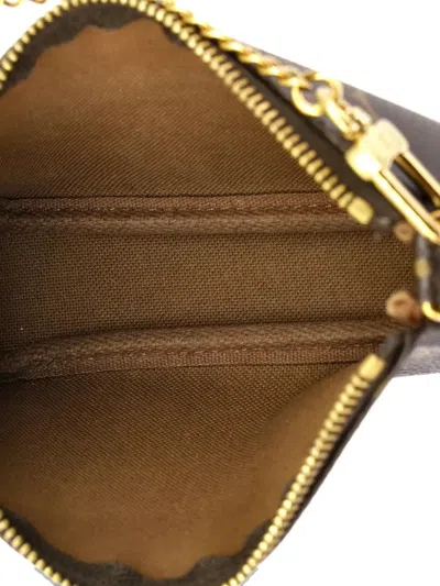 Pre-owned Louis Vuitton Pochette Accessoires Monogram Canvas Mini Clutch Bag In Brown