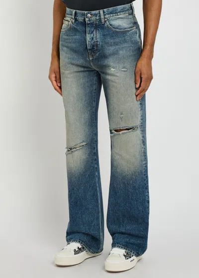 Amiri Slashed Distressed Bootcut Jeans In Blue