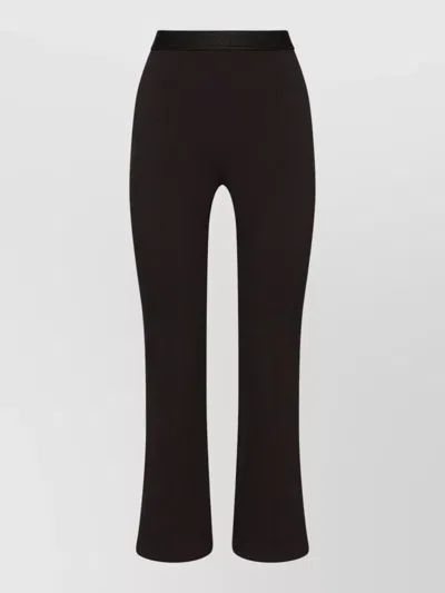 Wolford Modern Flared Jersey Trousers In Brown