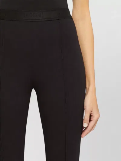Wolford Modern Flared Jersey Trousers In Brown