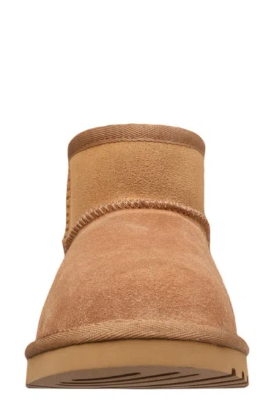 Mykos Genuine Shearling Lined Suede Bootie In Animal Print