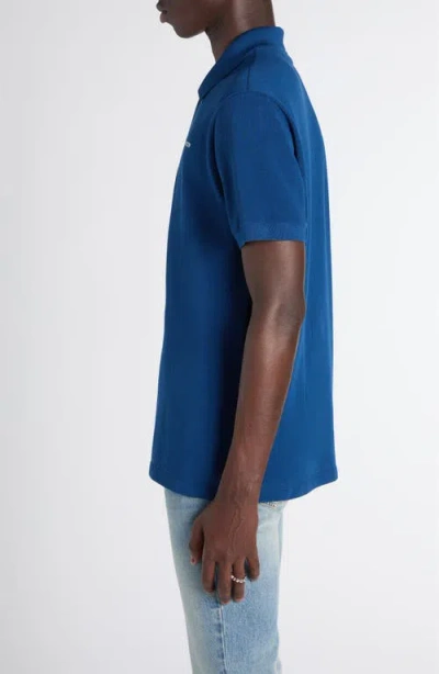 Alexander Mcqueen Mcqueen Embroidered Logo Cotton Piqué Polo In Blue