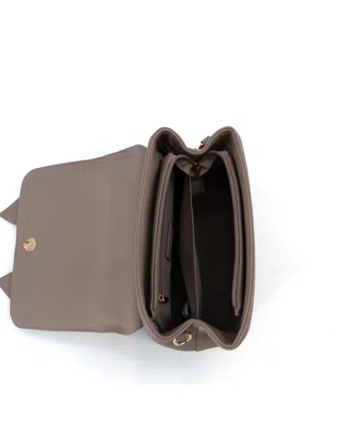 Like Dreams Noble Cross-bow Embossed Small Satchel Bag In Brown