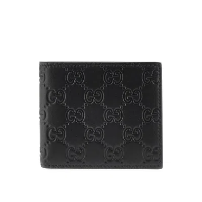 Gucci Men Gg Emblem Leather Wallet With Embossed Gg Logo In Black