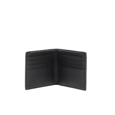 Gucci Men Gg Emblem Leather Wallet With Embossed Gg Logo In Black