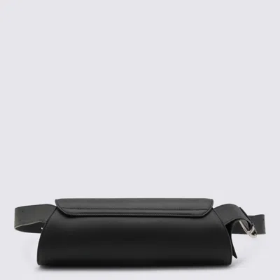 Jil Sander Cannolo Logo Embossed Small Shoulder Bag In Black