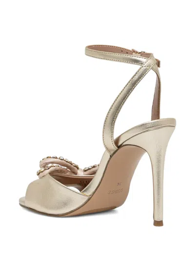 Guess Usa Bow Embellished Pumps In Gold