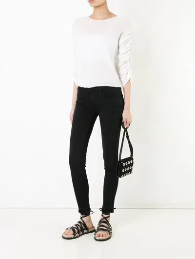 Frame Skinny Jeans In Black