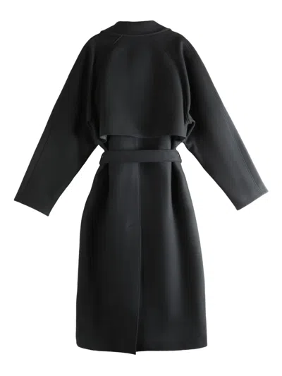 The Row Double-breasted Belted Trench Coat In Black