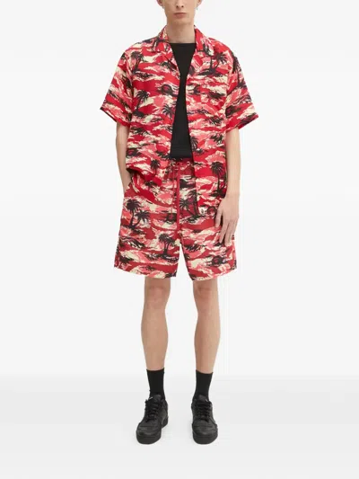 A Bathing Ape Palm-tree Printed Shorts In Red