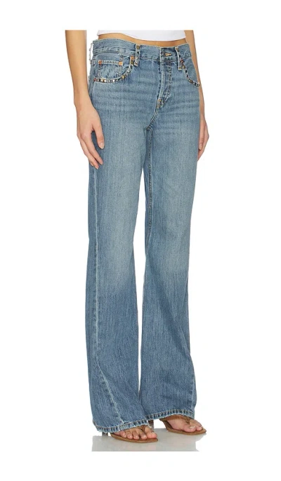 Re/done Twisted Mid Rise Bootcut Jeans In Blue