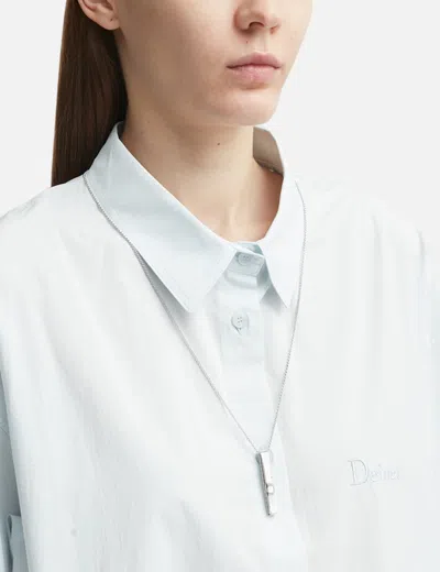 Avgvst Tie Clip On A Chain In Metallic