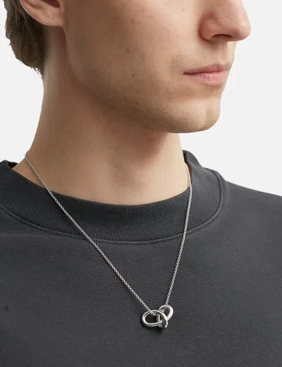 Avgvst Small Mathematical Knot On A Chain In Metallic