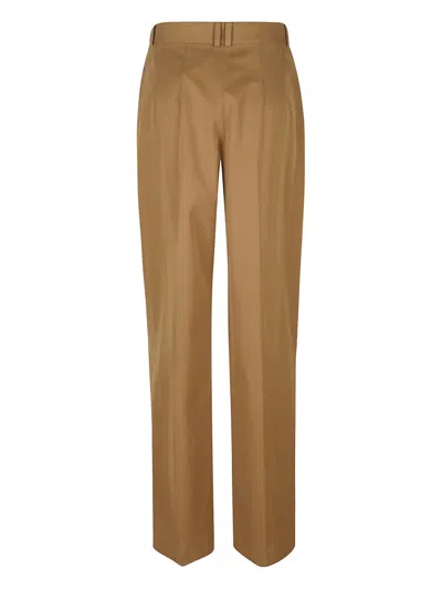 The Row Pleated Trousers In Brown
