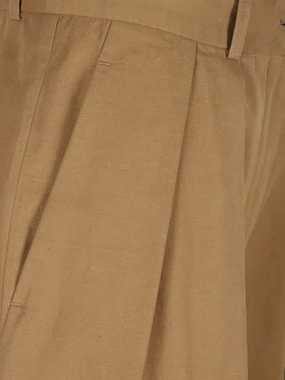 The Row Pleated Trousers In Brown