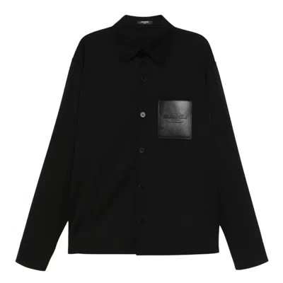 Balmain Men Black Shirt With Classic Collar And Logo Detail On The Pocket In Wool Stretch Man In Black