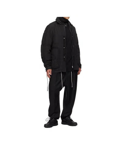 Mordecai Tapered Black Trousers With Pleated Front In Black
