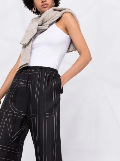 Totême Toteme Women Silk Trousers With Monogram Logo Embroidery In Multi