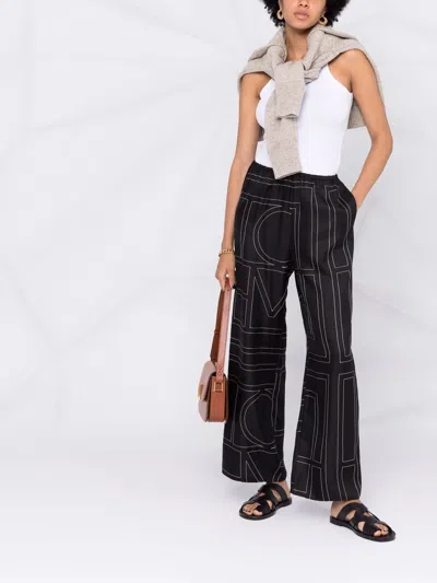 Totême Toteme Women Silk Trousers With Monogram Logo Embroidery In Multi