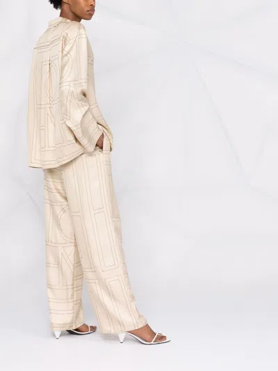 Totême Monogram Silk Straight-leg Ankle Pajama Pants In Brown