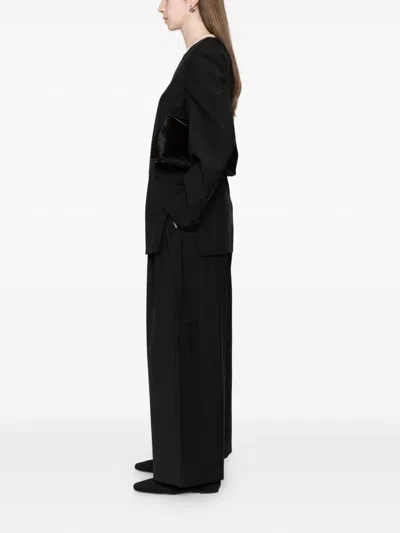 Totême Toteme Pre Wool Drawstring Trousers In Black