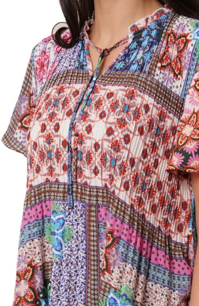 Sunny Leigh Ruffle Pleated Tie Neck Short Sleeve Top In Multi