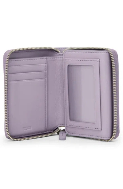 Tumi Belden Trifold Leather Zip Wallet In Purple