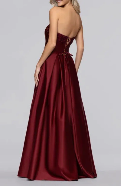 Blondie Nites Lam Corset Strapless Satin Gown In Burgundy