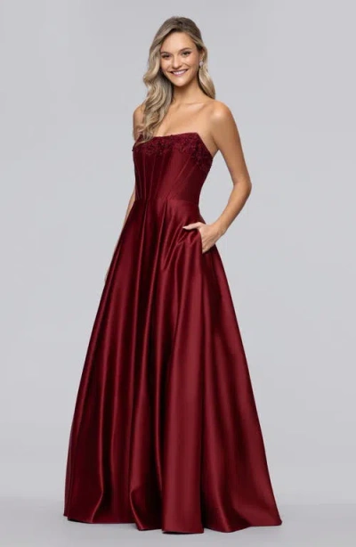 Blondie Nites Lam Corset Strapless Satin Gown In Burgundy
