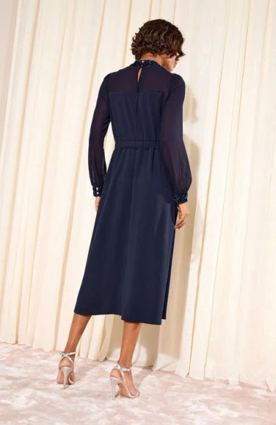 Friends Like These Long Sleeve Mixed Media Cocktail Dress In Blue