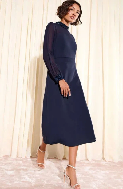 Friends Like These Long Sleeve Mixed Media Cocktail Dress In Blue