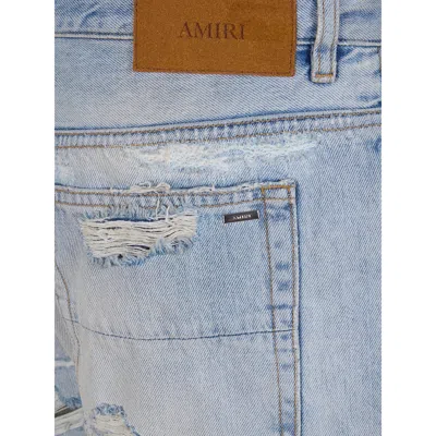 Amiri Distressed-effect Denim Jeans In Blue