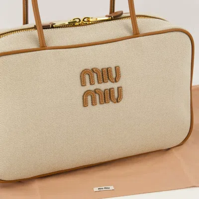 Miu Miu Logo-embroidered Zip Tote Bag In Neutral