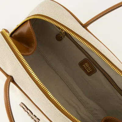 Miu Miu Logo-embroidered Zip Tote Bag In Neutral