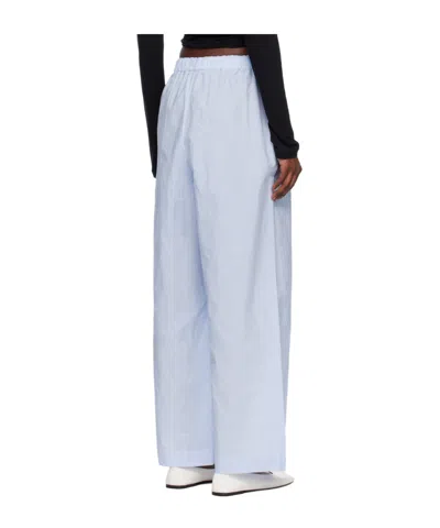 Baserange Striped Trousers In Blue