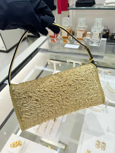 Valentino Garavani Mini Structured Handbag With Signature Detailing In Gold