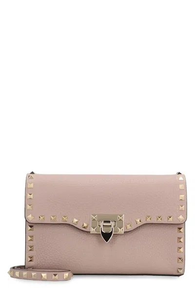 Valentino Garavani Rockstud Piccola Leather Crossbody Bag In Pink